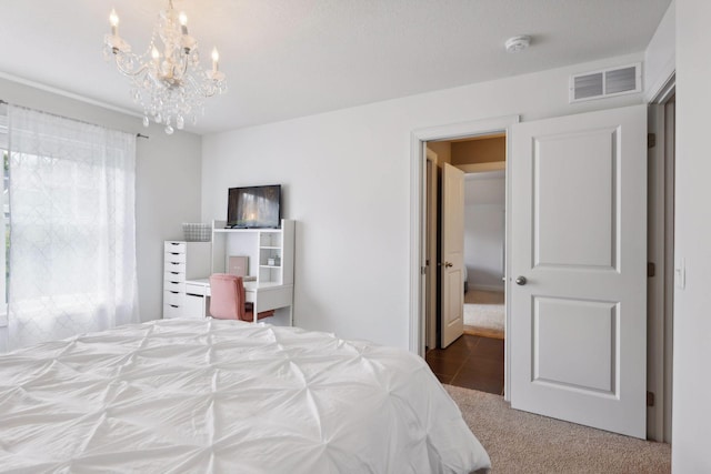3365 Osgood Way N, Baytown Twp, MN 55082 - bedroom with carpet floors and a chandelier