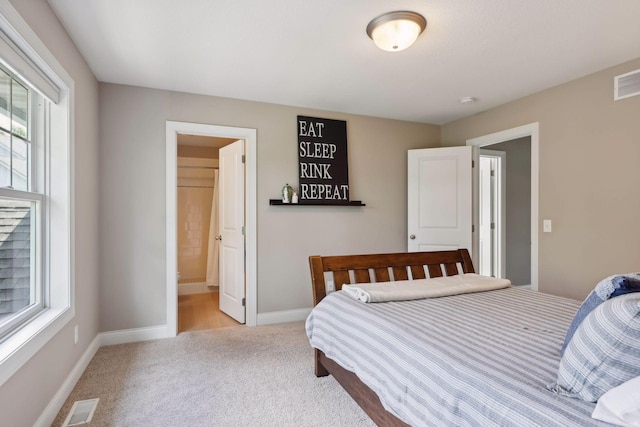 3365 Osgood Way N, Baytown Twp, MN 55082 - bedroom featuring light carpet and multiple windows