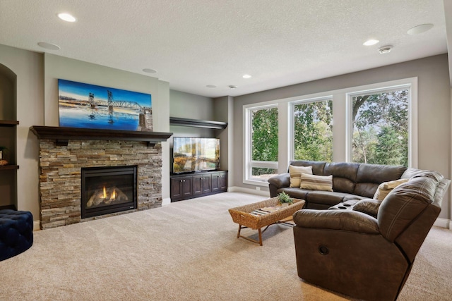 3365 Osgood Way N, Baytown Twp, MN 55082 - carpeted living area featuring a textured ceiling, a fireplace, and recessed lighting