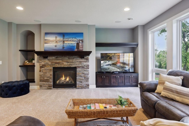 3365 Osgood Way N, Baytown Twp, MN 55082 - carpeted living area with a fireplace, recessed lighting, and built in features