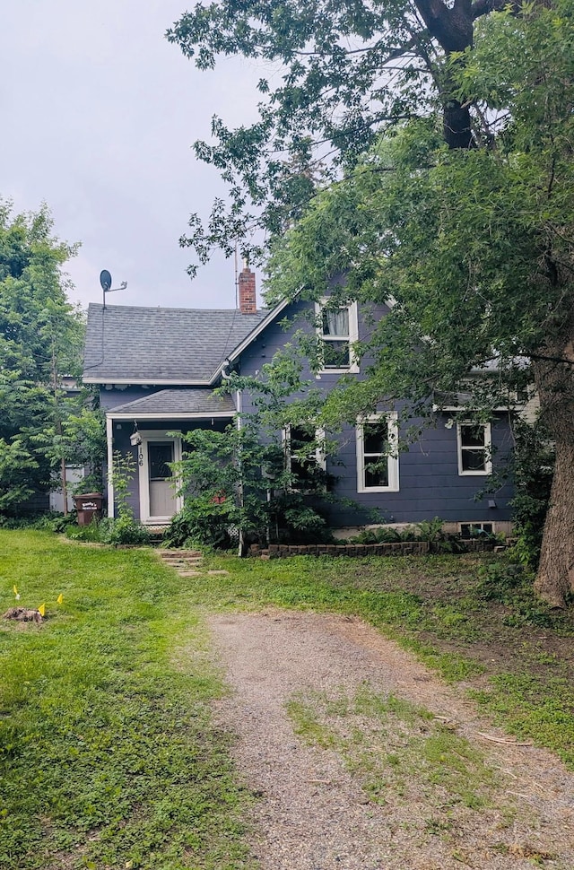 106 2nd St NE, Buffalo, MN 55313 - view of front of house featuring a chimney