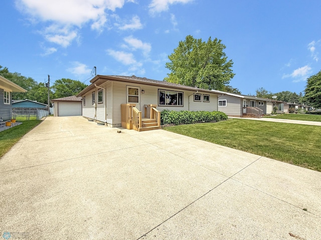 1737 14 1/2 St S, Fargo, ND 58103 - ranch-style house featuring an outbuilding and a garage