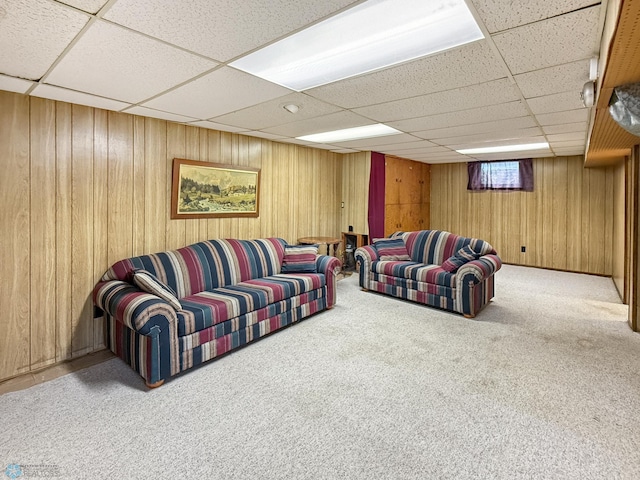 1737 14 1/2 St S, Fargo, ND 58103 - carpeted living area featuring a drop ceiling and wood walls
