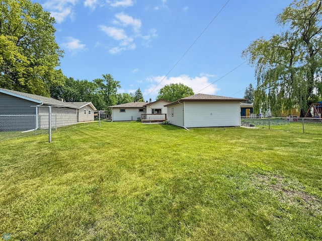 1737 14 1/2 St S, Fargo, ND 58103 - fenced backyard with a deck