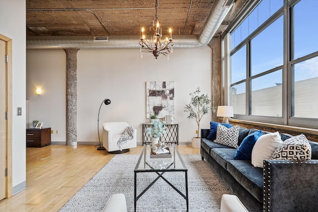 521 7th St Unit 420, Minneapolis, MN 55415 - living room featuring light wood-style floors and a chandelier