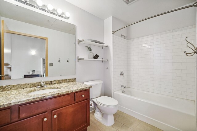 521 7th St Unit 420, Minneapolis, MN 55415 - bathroom with vanity, tile patterned floors, and shower / tub combination