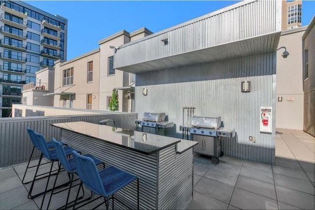 521 7th St Unit 420, Minneapolis, MN 55415 - view of patio with an outdoor kitchen