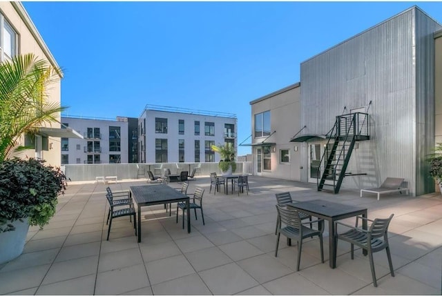 521 7th St Unit 420, Minneapolis, MN 55415 - view of patio with outdoor dining area and stairway