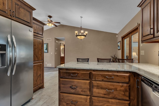 1213 4 1/2 Ave N, Sauk Rapids, MN 56379 - kitchen featuring appliances with stainless steel finishes, lofted ceiling, ceiling fan, light stone counters, and decorative light fixtures