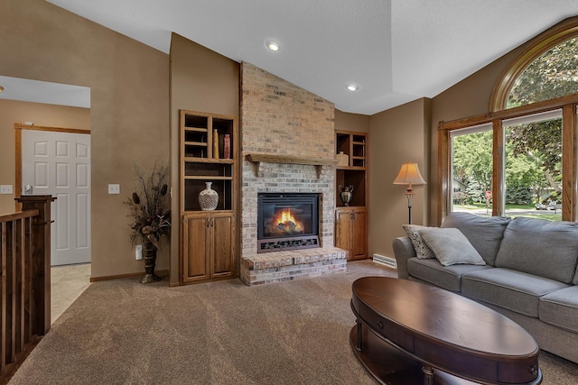 1213 4 1/2 Ave N, Sauk Rapids, MN 56379 - living room with lofted ceiling, light carpet, a fireplace, and recessed lighting