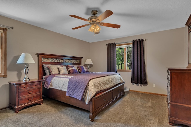 1213 4 1/2 Ave N, Sauk Rapids, MN 56379 - carpeted bedroom featuring baseboards and a ceiling fan