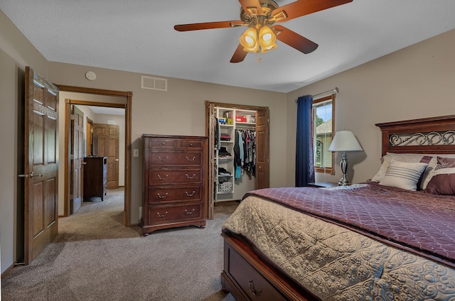 1213 4 1/2 Ave N, Sauk Rapids, MN 56379 - bedroom with carpet, a spacious closet, a closet, and a ceiling fan