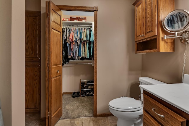 1213 4 1/2 Ave N, Sauk Rapids, MN 56379 - bathroom with toilet and vanity