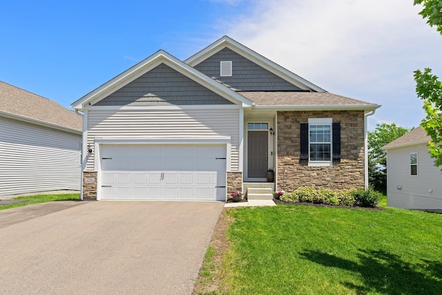 256 16th Ave SE, Lonsdale, MN 55046 - craftsman house with stone siding, concrete driveway, a front lawn, an attached garage, and entry steps