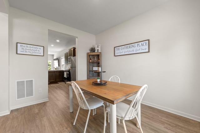 256 16th Ave SE, Lonsdale, MN 55046 - dining area featuring light wood finished floors and recessed lighting