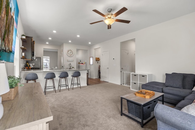 256 16th Ave SE, Lonsdale, MN 55046 - living area with carpet flooring, ceiling fan, and recessed lighting