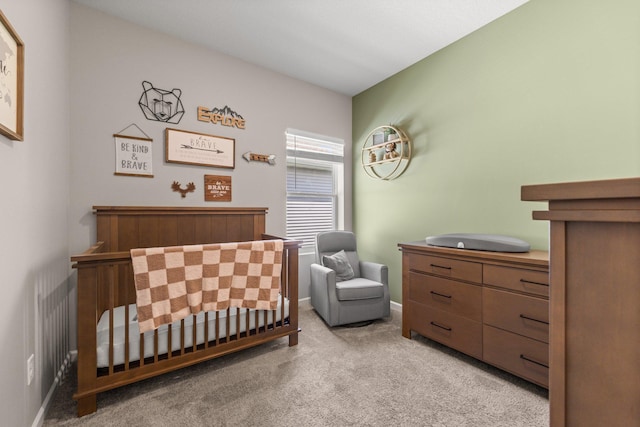 256 16th Ave SE, Lonsdale, MN 55046 - bedroom featuring light colored carpet and a nursery area
