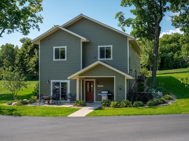 30424 410th Street Unit 4 (Share 3) - Cic #65, Dent, MN 56528 - view of front of house featuring a front yard and a patio