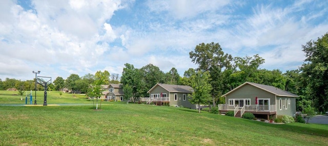 30424 410th Street Unit 4 (Share 3) - Cic #65, Dent, MN 56528 - view of green lawn with a wooden deck