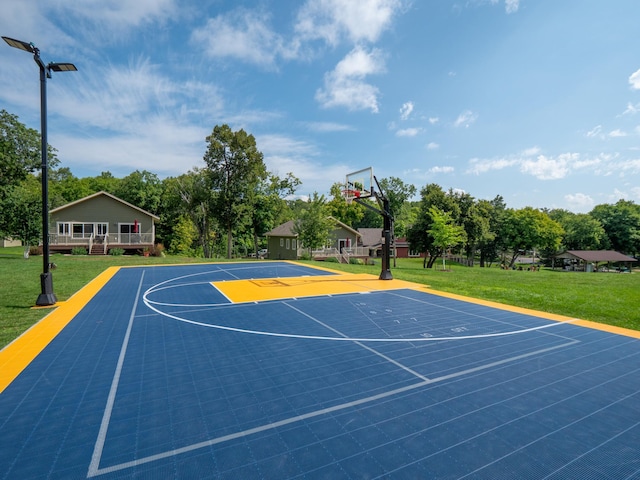 30424 410th Street Unit 4 (Share 3) - Cic #65, Dent, MN 56528 - view of basketball court featuring community basketball court, a lawn, and view of scattered trees