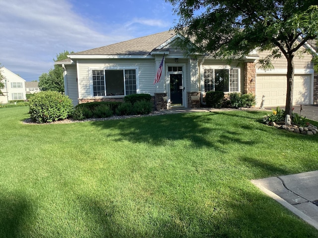 2009 Stahlke Way Unit 15, Chaska, MN 55318 - view of front of home featuring a front lawn, a garage, stone siding, and driveway