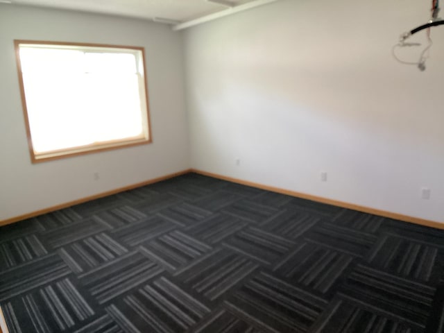 2009 Stahlke Way Unit 15, Chaska, MN 55318 - spare room featuring dark colored carpet and baseboards