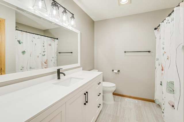 18250 221st Ave NW, Big Lake, MN 55309 - bathroom with vanity and wood finished floors