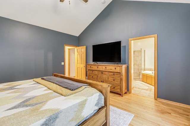 18250 221st Ave NW, Big Lake, MN 55309 - bedroom featuring high vaulted ceiling, light wood-type flooring, ensuite bath, and a ceiling fan