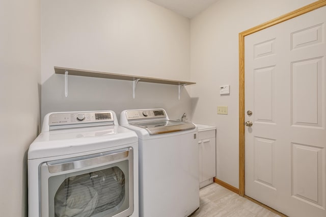 18250 221st Ave NW, Big Lake, MN 55309 - laundry room with washer and dryer and cabinet space