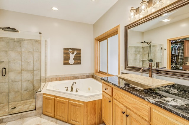 18250 221st Ave NW, Big Lake, MN 55309 - bathroom with a shower stall, vanity, a whirlpool tub, and recessed lighting
