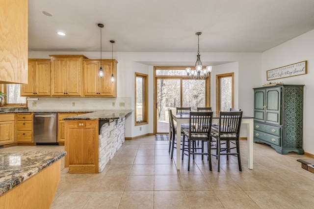 18250 221st Ave NW, Big Lake, MN 55309 - kitchen with dishwasher, healthy amount of natural light, a chandelier, decorative backsplash, and recessed lighting