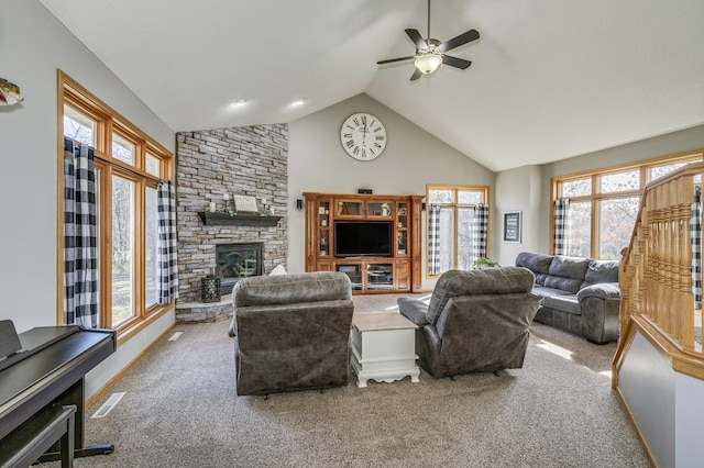 18250 221st Ave NW, Big Lake, MN 55309 - living area with carpet flooring, a fireplace, a ceiling fan, and high vaulted ceiling