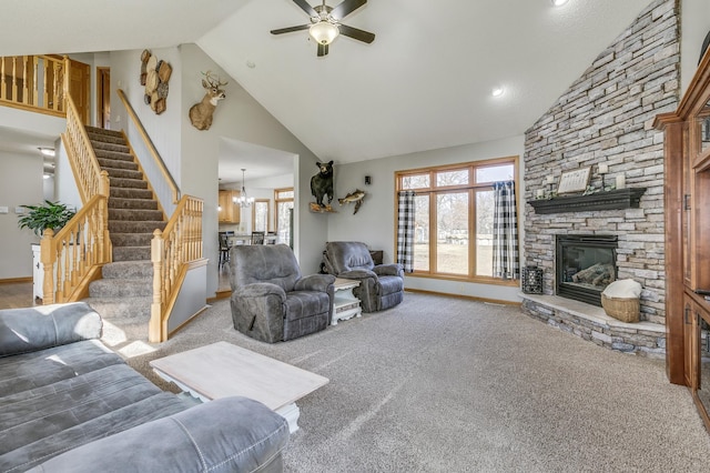 18250 221st Ave NW, Big Lake, MN 55309 - living area featuring high vaulted ceiling, a fireplace, carpet, ceiling fan, and stairway