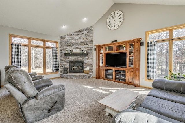 18250 221st Ave NW, Big Lake, MN 55309 - carpeted living room featuring high vaulted ceiling and a stone fireplace