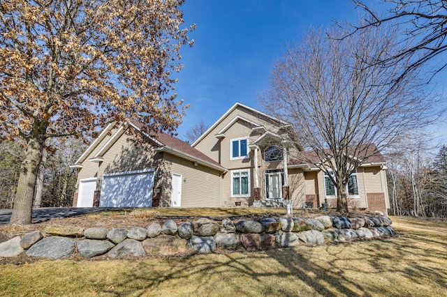 18250 221st Ave NW, Big Lake, MN 55309 - traditional home with a garage, driveway, and a front lawn