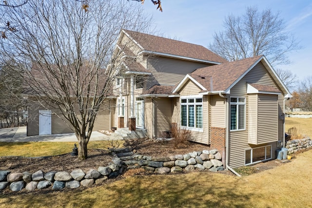 18250 221st Ave NW, Big Lake, MN 55309 - view of front of house featuring roof with shingles and a front yard