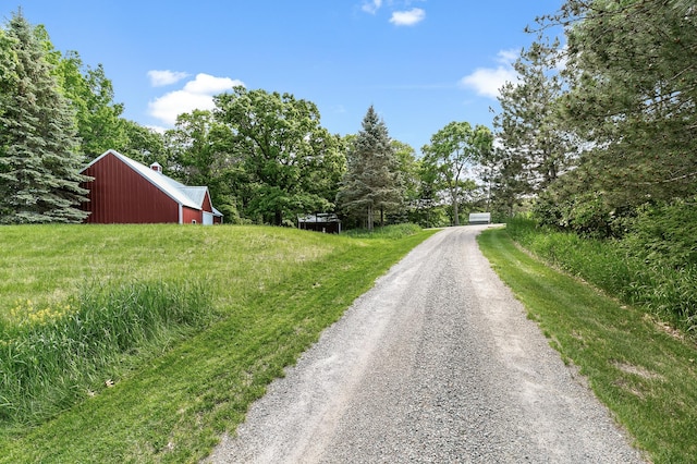 15015 Held Cir, Cold Spring, MN 56320 - view of dirt / gravel driveway with a pole building
