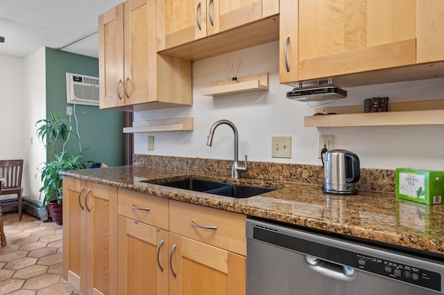 333 8th St SE Unit 120, Minneapolis, MN 55414 - kitchen with dishwasher, a wall unit AC, light brown cabinetry, and dark stone counters