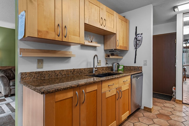 333 8th St SE Unit 120, Minneapolis, MN 55414 - kitchen featuring stainless steel dishwasher, open shelves, a textured ceiling, and dark stone countertops