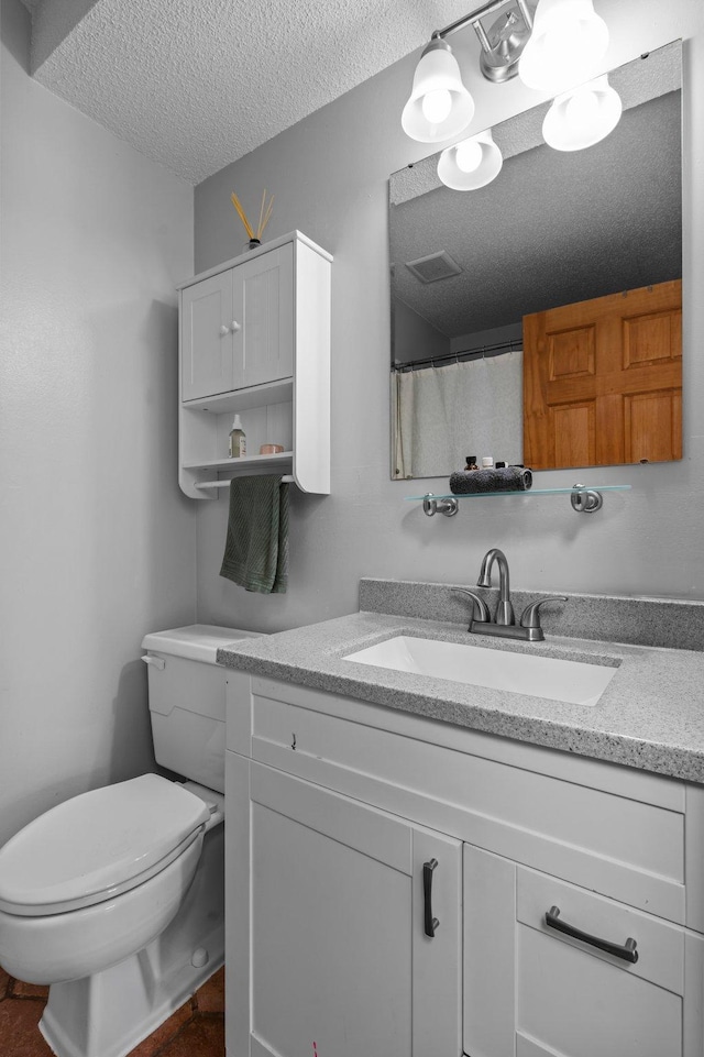 333 8th St SE Unit 120, Minneapolis, MN 55414 - bathroom with a textured ceiling and vanity