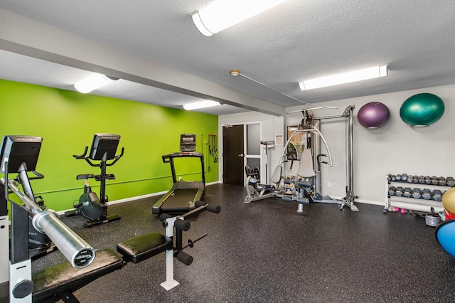 333 8th St SE Unit 120, Minneapolis, MN 55414 - workout area featuring a textured ceiling