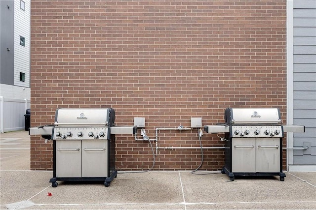 333 8th St SE Unit 120, Minneapolis, MN 55414 - view of patio / terrace featuring a grill