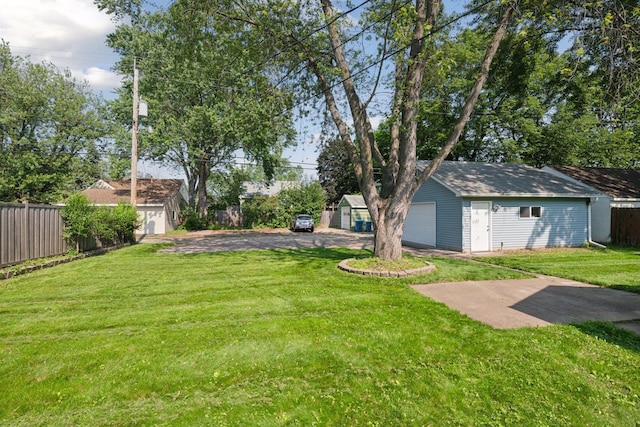 7507 Blaisdell Ave, Richfield, MN 55423 - view of yard featuring an outdoor structure and a detached garage