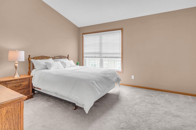 4107 Scott Ave N, Robbinsdale, MN 55422 - bedroom featuring vaulted ceiling and light carpet