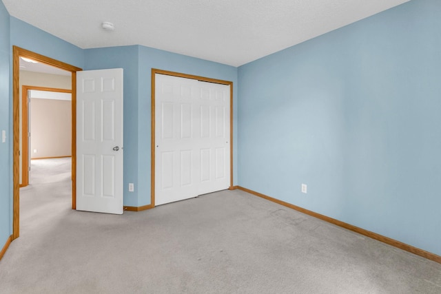 4107 Scott Ave N, Robbinsdale, MN 55422 - unfurnished bedroom featuring carpet floors and a closet