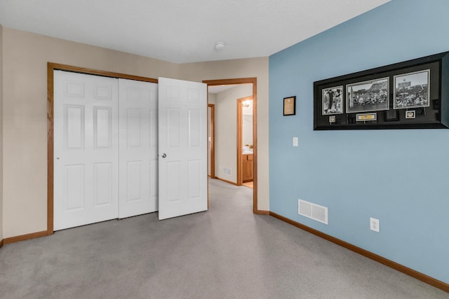4107 Scott Ave N, Robbinsdale, MN 55422 - unfurnished bedroom with carpet and a closet