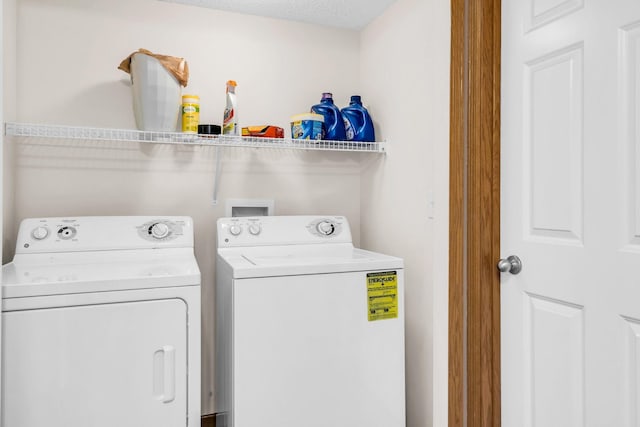 4107 Scott Ave N, Robbinsdale, MN 55422 - laundry room with washer and clothes dryer
