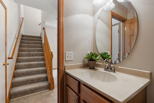 10794 Hawthorn Trl Unit A, Woodbury, MN 55129 - bathroom featuring vanity and tile patterned flooring