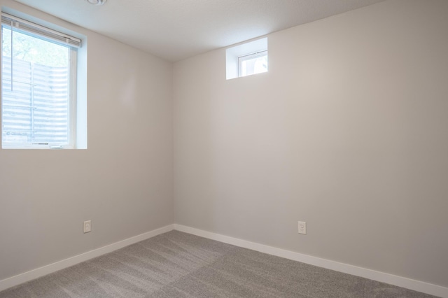 3555 Queen Ave N, Minneapolis, MN 55412 - unfurnished room with baseboards and carpet