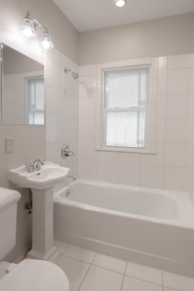 3555 Queen Ave N, Minneapolis, MN 55412 - bathroom with tile patterned floors and shower / tub combination
